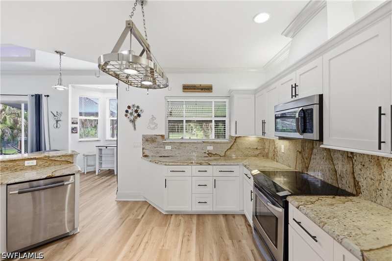 4 bedroom SingleFamilyResidence at 104 12th Ave NW, Golden Gate Estates, Naples — photo 1