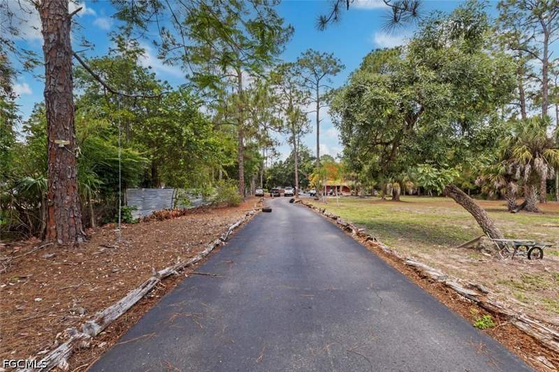 4 bedroom SingleFamilyResidence at 1445 31st St SW, Golden Gate Estates, Naples — photo 3