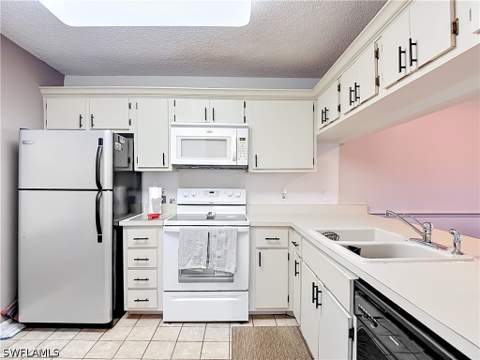 1708 Kings Lake Blvd 5-106, Naples FL - photo 7 of 49