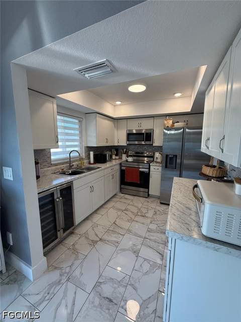 1027 Hancock Bridge Pkwy, Cape Coral FL - photo 6 of 25