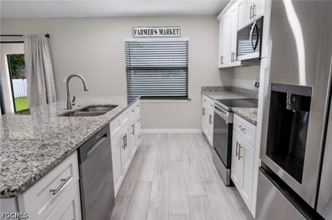 1028 Champion Ave, Lehigh Acres FL - photo 15 of 42