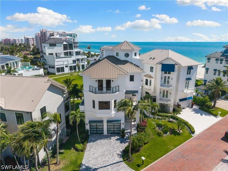 4 bedroom SingleFamilyResidence at 104 Kaula LN, BAREFOOT BEACH, Bonita Springs — photo 1