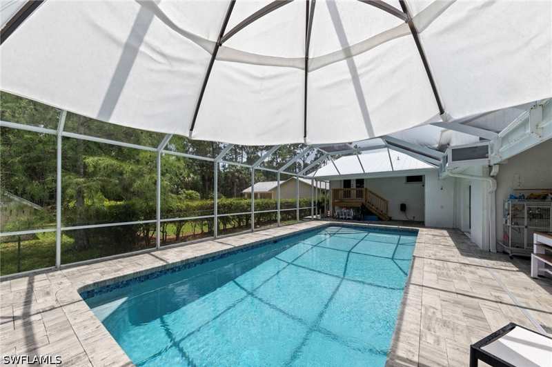 4 bedroom SingleFamilyResidence at 2720 68th St SW, Golden Gate Estates, Naples — photo 1