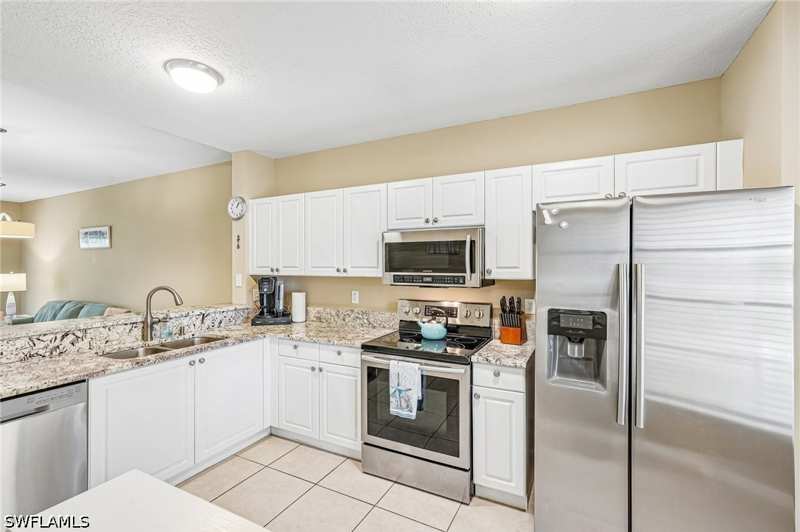 2 bedroom Condominium at 9185 Celeste Dr 1-103, Coral Falls Resort, Naples — photo 1