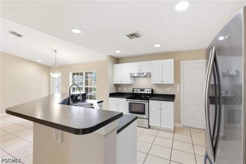 919 Winters St E, Lehigh Acres FL - photo 10 of 24