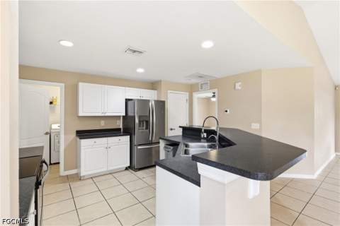 919 Winters St E, Lehigh Acres FL - photo 9 of 24