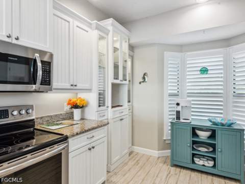 232 La Peninsula Blvd 232, Naples FL - photo 7 of 44