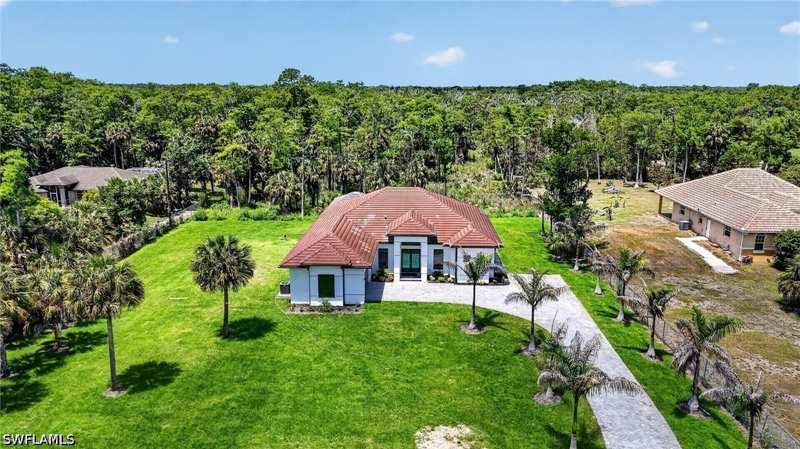 4 bedroom SingleFamilyResidence at 563 15th St NW, Golden Gate Estates, Naples — photo 1