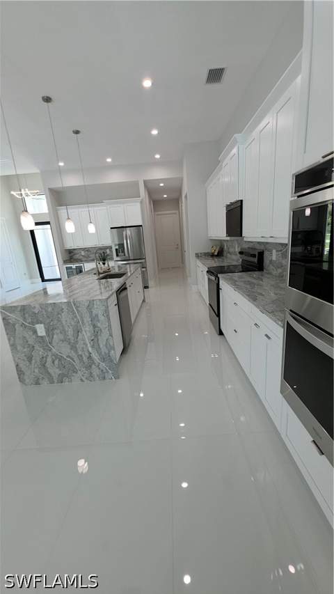 563 15th St NW, Naples FL - photo 10 of 26