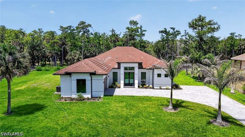 4 bedroom SingleFamilyResidence at 563 15th St NW, Golden Gate Estates, Naples — photo 2