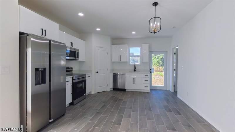 4 bedroom SingleFamilyResidence at 2173 Mitchell Ct, Harlem Lake, Fort Myers — photo 4