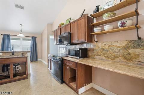 4129 NE 14th Pl, Cape Coral FL - photo 9 of 25