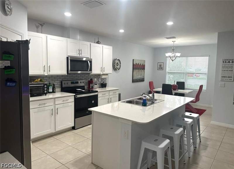 4 bedroom SingleFamilyResidence at 932 SW 7th Ave, Cape Coral, Cape Coral — photo 4