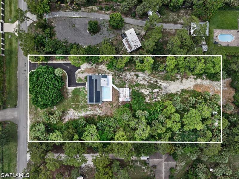4 bedroom SingleFamilyResidence at 280 1st St NW, Golden Gate Estates, Naples — photo 3