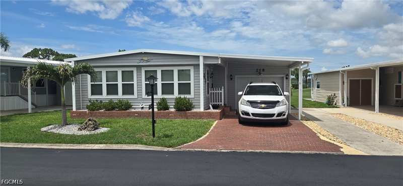 3 bedroom ManufacturedHome at 218 Nicklaus Blvd, Six Lakes Country Club, North Fort Myers — photo 1