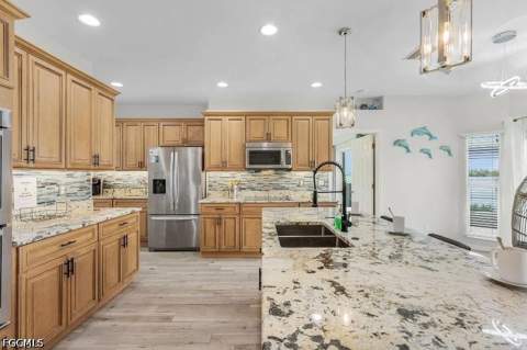 4885 E Riverside Dr, Fort Myers FL - photo 8 of 44