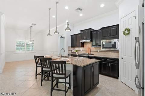 9436 Whooping Crane Way, Naples FL - photo 16 of 46