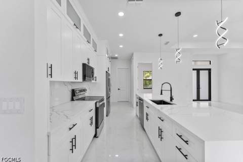 811 Rush Ave, Lehigh Acres FL - photo 24 of 49