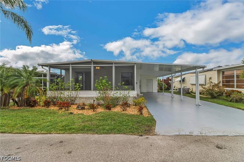 2 bedroom ManufacturedHome at 243 Tangerine Dr, Orange Harbor Mobile Home Park, Fort Myers — photo 3
