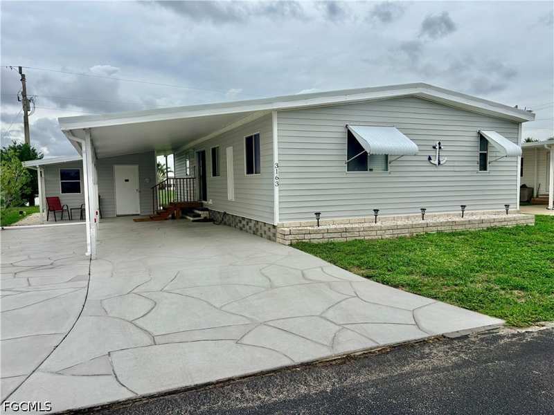 2 bedroom ManufacturedHome at 3163 Indian Village Ln, Lake Arrowhead Mob Village, North Fort Myers — photo 1