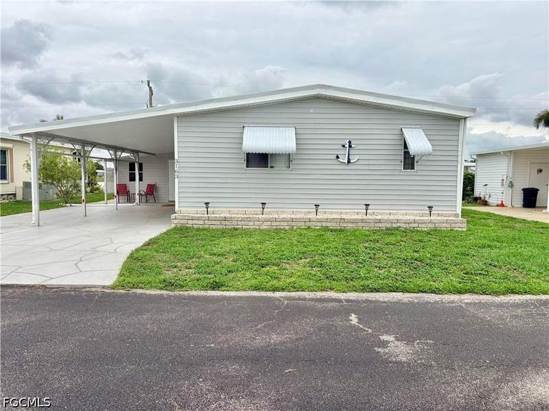 2 bedroom ManufacturedHome at 3163 Indian Village Ln, Lake Arrowhead Mob Village, North Fort Myers — photo 2