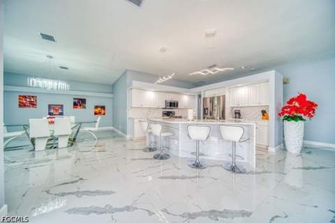 946 SE 23rd Pl, Cape Coral FL - photo 13 of 46