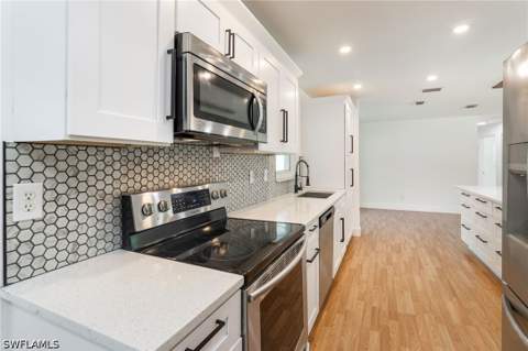 417 Roosevelt Ave, Lehigh Acres FL - photo 12 of 26