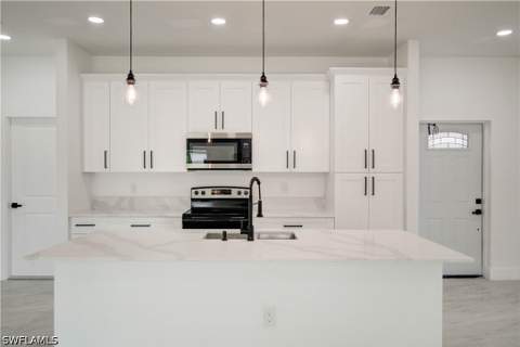 1020 Carroll St E, Lehigh Acres FL - photo 10 of 31