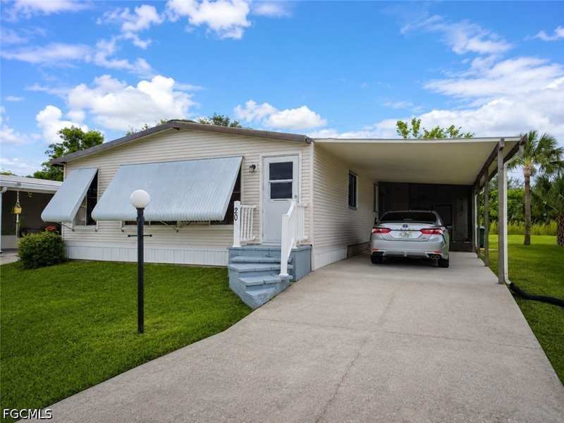 2 bedroom ManufacturedHome at 20 Grosbeak Ln 20, Quail Roost, Naples — photo 1