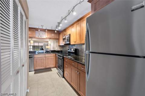 236 Pebble Beach Cir A202, Naples FL - photo 10 of 25