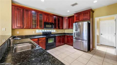 1703 Sarazen Pl, Naples FL - photo 17 of 38