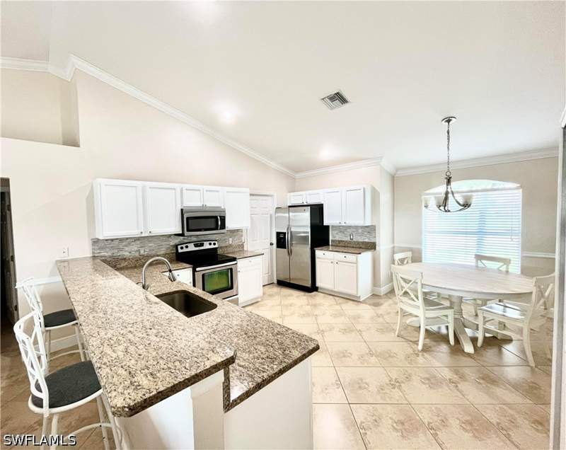 4 bedroom SingleFamilyResidence at 2720 NE 1st Pl, Cape Coral, Cape Coral — photo 5