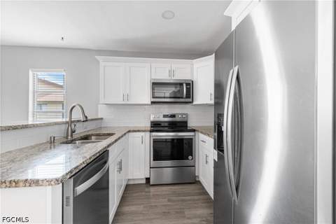 1031 SE 8th Ter 2H, Cape Coral FL - photo 6 of 12