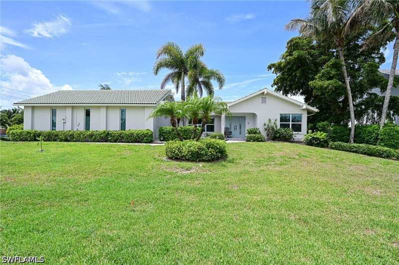 3 bedroom SingleFamilyResidence at 202 6th St, Little Hickory Shores, Bonita Springs — photo 1