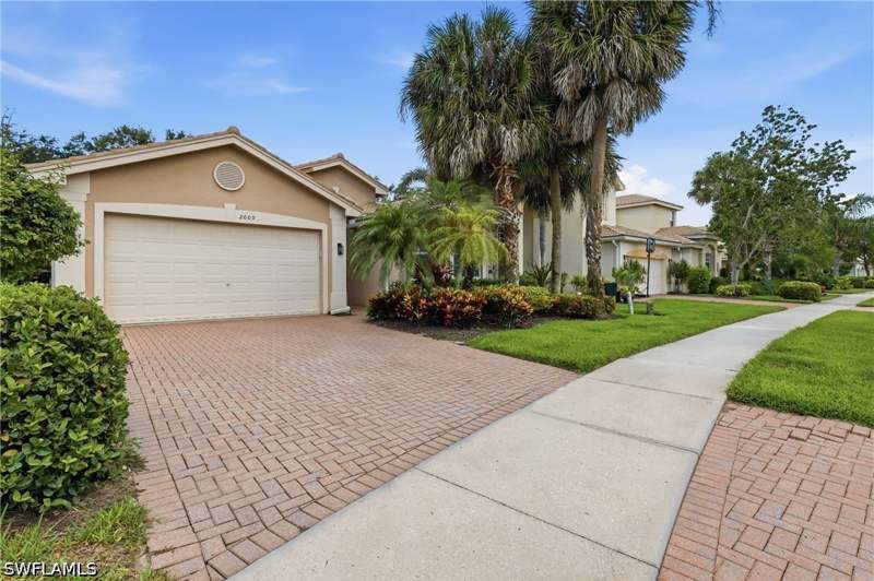 3 bedroom SingleFamilyResidence at 2009 Isla De Palma Cir, Saturnia Lakes, Naples — photo 2
