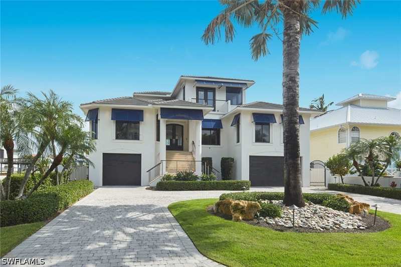 4 bedroom SingleFamilyResidence at 319 Lagoon Ave, Conners, Naples — photo 1