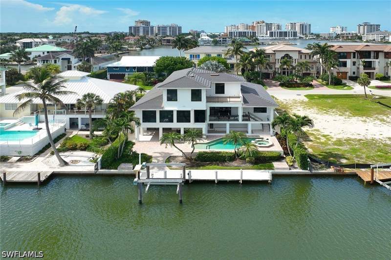 4 bedroom SingleFamilyResidence at 319 Lagoon Ave, Conners, Naples — photo 2