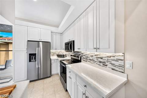 1855 Les Chateaux Blvd 5-201, Naples FL - photo 9 of 48