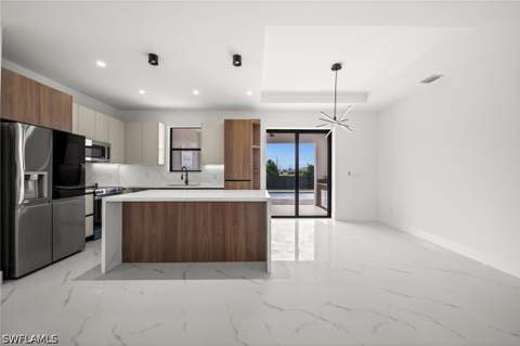 409 NW 25th Pl, Cape Coral FL - photo 11 of 45