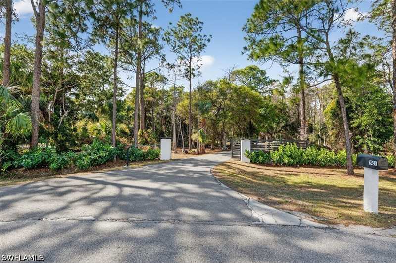 6 bedroom SingleFamilyResidence at 361 27th St SW, Golden Gate Estates, Naples — photo 1