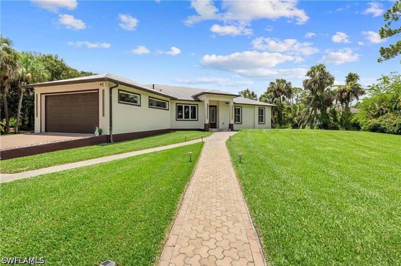 4 bedroom SingleFamilyResidence at 556 6th St SE, Golden Gate Estates, Naples — photo 1