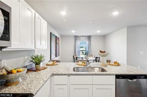 750 Naples Ave S, Lehigh Acres FL - photo 9 of 35