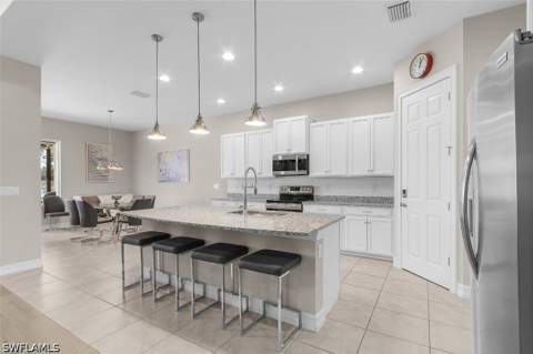 14539 Kelson Cir, Naples FL - photo 8 of 38