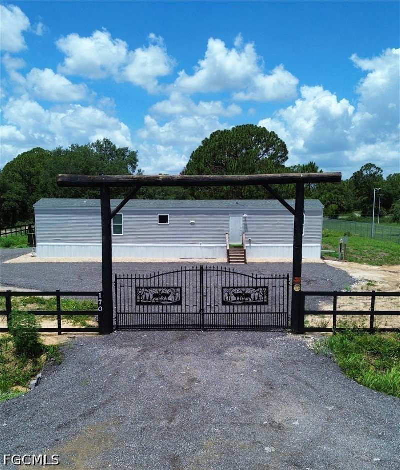 3 bedroom ManufacturedHome at 170 S Jinete St, Montura Ranch Estates, Clewiston — photo 1