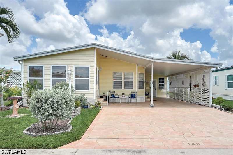2 bedroom ManufacturedHome at 148 Seven Seas Way, Windjammer Village Of Naples, Naples — photo 1