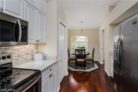 6658 Castlelawn Pl 9, Naples FL - photo 10 of 38