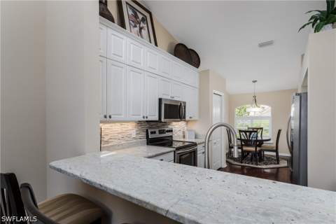 6658 Castlelawn Pl 9, Naples FL - photo 7 of 38