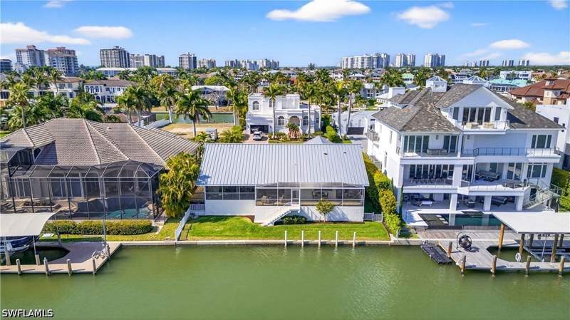 4 bedroom SingleFamilyResidence at 240 Channel Dr, Conners, Naples — photo 2