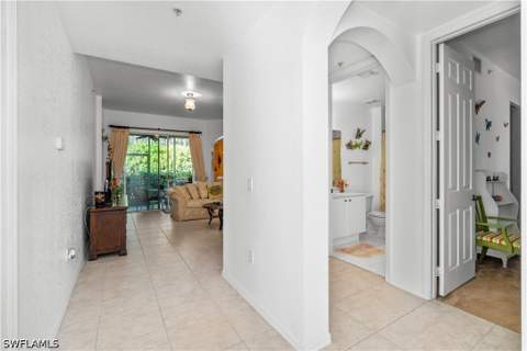 1405 Mariposa Cir 102, Naples FL - photo 9 of 43