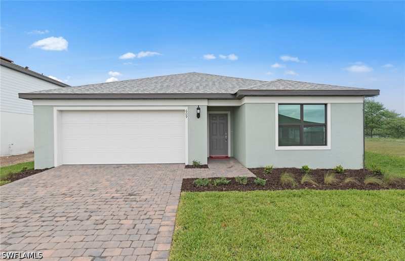 3 bedroom SingleFamilyResidence at 634 Lakeside Oasis Ave, Whispering Lakes, Lehigh Acres — photo 1